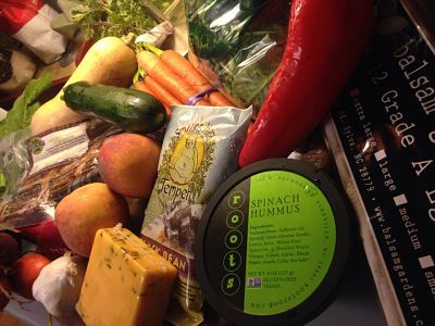 A few things in a Mother Earth produce box may include local tempeh, hummus, cheese, fruits and vegeables