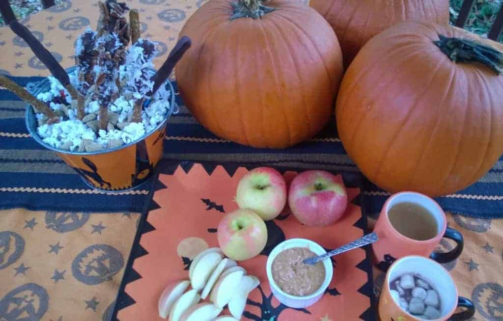 Celebrate Halloween with apples, cocoa, cider, popcorn and pretzel sticks.
