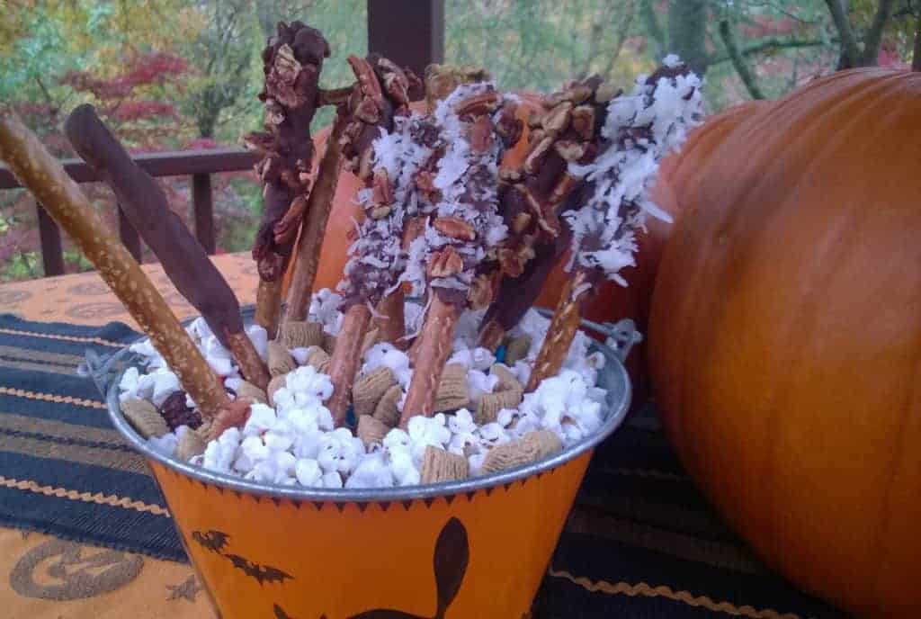 This popcorn snack mix along with some chocolate dipped pretzel rods make delicious and healthy Halloween treats for a party